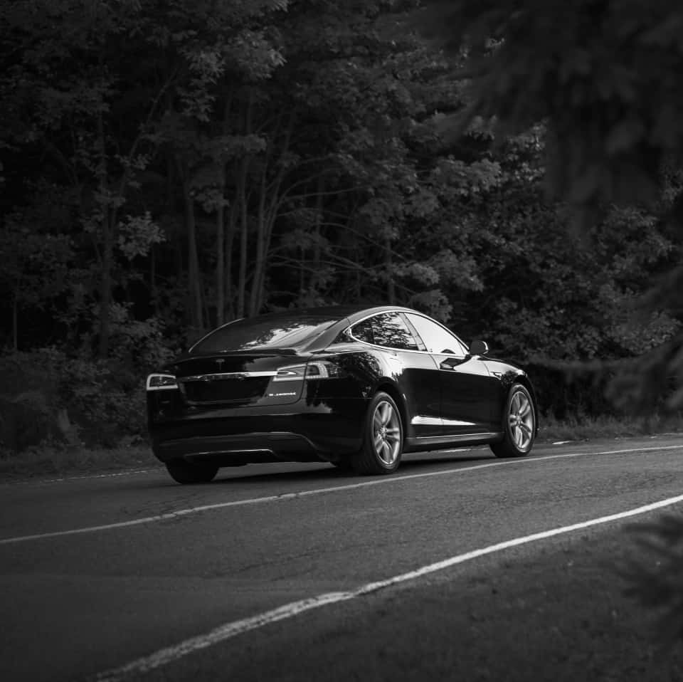 Black Luxury Car on Road